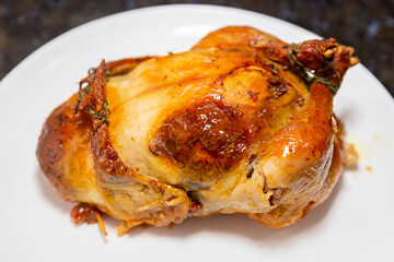 Traditional homemade roast chicken, stuffed with farofa