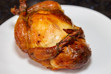Traditional homemade roast chicken, stuffed with farofa
