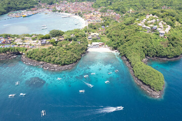 Aerial view of Blue Logoon Beach and Padangbai bay on sunny day. Manggis, Bali, Indonesia.
