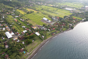 Aerial view of northern coast on sunny evening. Lovina, Bali, Indonesia. © Kirill