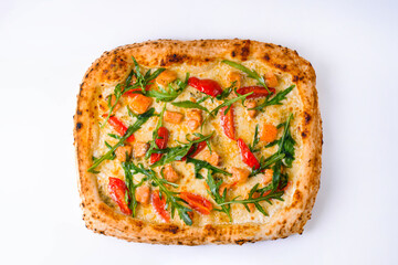 pizza with salmon, cherry tomatoes and arugula on a white background