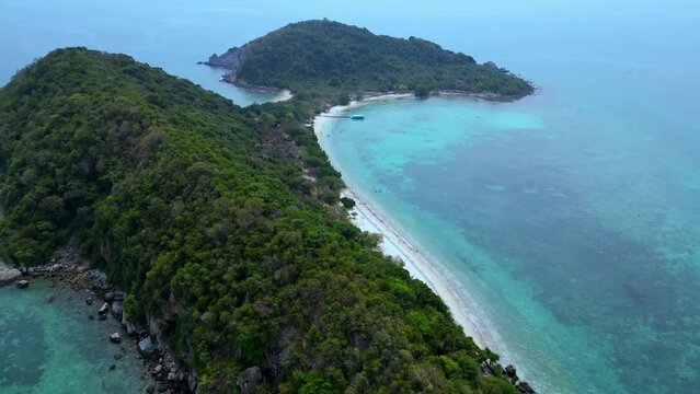 Drone footage. Thailand Isand Ko Kham near Pattaya - The Emerald Island.
This is a tiny island that is located 35 km from the coast of Pattaya and just 1 km from Koh Mak. 