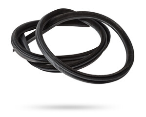 Rolled up black rubber sealant for elements of the car body, doors or trunk, for noise insulation, thermal and sound, preventing heat loss in the car interior. Sealing gasket for repair in a workshop.