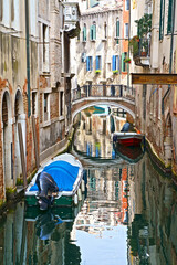 Fototapeta na wymiar Picturesque streets of Venice. Venice, Veneto region, Italy - September 2023: Canal in Venice. Traditional architecture of Venice