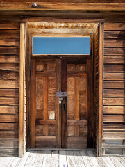 Rustic weathered old wooded door locked