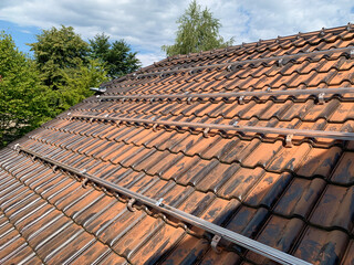 Profiles on the roof of a house for laying solar panels