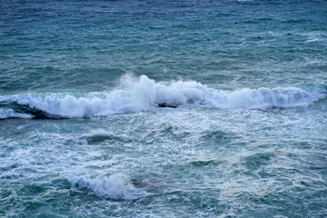 Sea. Beautiful waves. vertiginous, swirling foamy water waves at the Mediterranean sea.