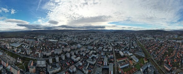 Aerial view of cityscape Cluj-Napoca surrounded by buildings