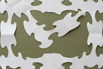 abstract decorative like cut paper on rough green paper