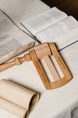 Grogger noisemaker for Purim. Rabbi with jewish hebrew bible is praying for Israel. Purim...