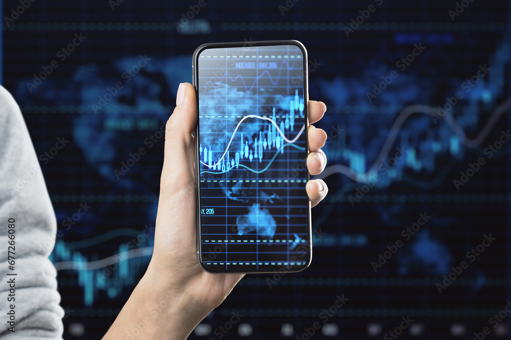 Poster smartphone displaying financial data graphs in hand