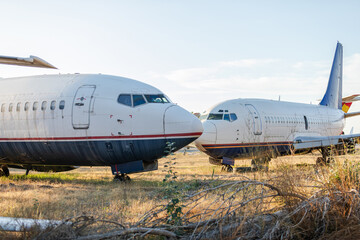 Fototapeta na wymiar Disassembled planes in the aircraft graveyard