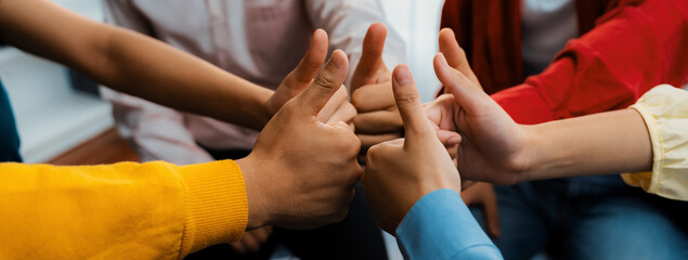 Startup company employee team stacking hand together symbolize successful group of business...