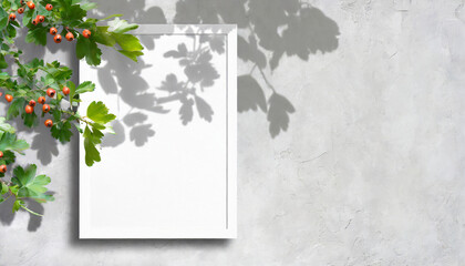 Empty white vertical rectangle poster mockup with soft hawthorn leaves shadows on neutral light grey concrete wall background.