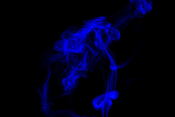 Obraz premium blue Smoke in cigarette in dark Background