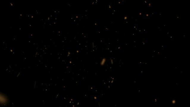 Huge falling VFX dust particles are isolated on a black background for composition.