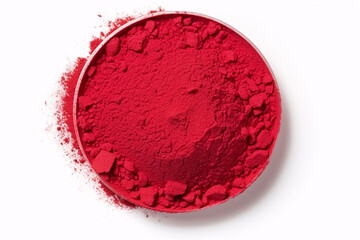 A vivid, untethered, matte eye shadow powder in a red hue isolated on white.