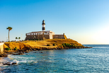 Sunset at the famous Farol da Barra in the city of Salvador, Bahia
