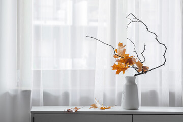 autumn composition on background window