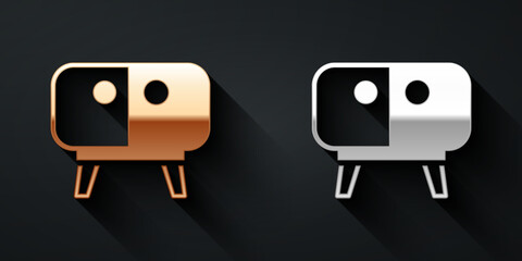 Gold and silver TV table stand icon isolated on black background. Long shadow style. Vector