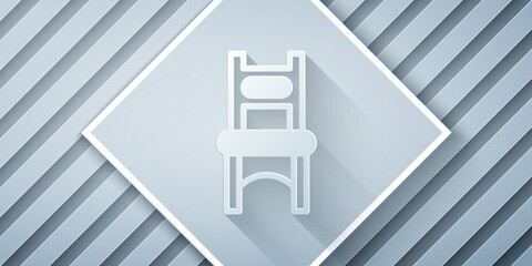 Paper cut Chair icon isolated on grey background. Paper art style. Vector