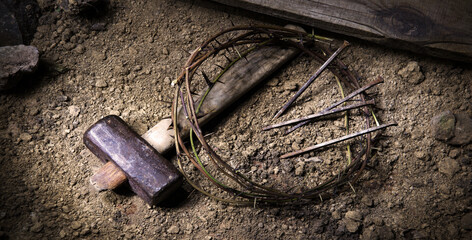 Rusty nails and a wreath of thorns at the cross