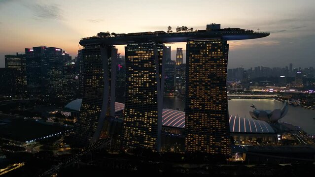 Night drone shot of Marina Bay Sands Hotel in Singapore