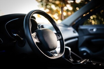 Close-up of the steering wheel in a modern car with