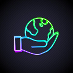 Glowing neon line Human hand holding Earth globe icon isolated on black background. Save earth concept. Vector