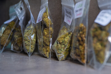 A variety of CBD strains Flowers and buds assorted in plastic bags
