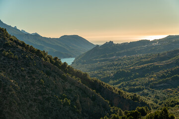 Fototapeta na wymiar Beautiful landscape wuih mountains at sunrise in Guadalest, Alicante (Spain).