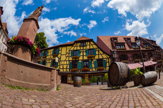 the colorful half timbered building in the streets of the beautiful Alsace village Riquewihr