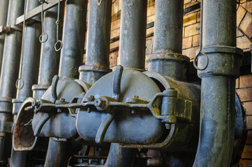 Gas retorts and chimneys on furnace at former gasworks