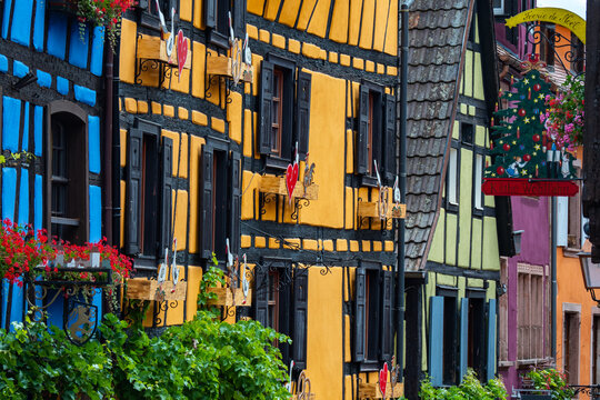 Beautiful colorful half timbered house of the village of  Riquewihr in Alsace France