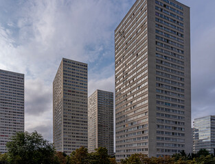 Fototapeta premium Ivry-Sur-Seine, France - 09 20 2021: View of vertiginous and vertical gray buildings .