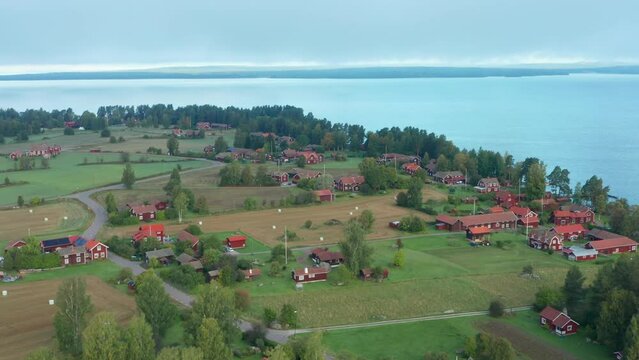 Drone view of village in rural landscape in countryside. Village in Sweden