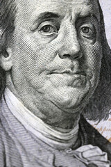 Closeup of Ben Franklin on a one hundred dollar bill for background