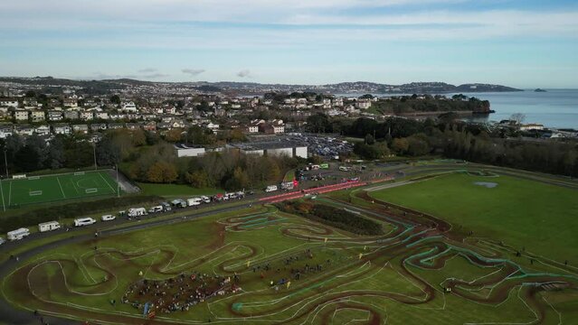 Paignton, Torbay, South Devon, England: DRONE VIEWS: A cyclo-cross cycling event at Torbay VeloPark with Torbay sea in the b/g. Torbay is a popular UK holiday resort with many tourist attractions.