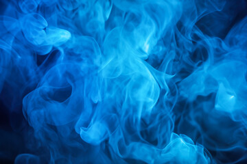 Blue smoke on dark background.