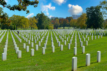 Fototapeta na wymiar Rows of heroes buried at Arlington National Cemetery in Virginia, some dating from the American Civil War