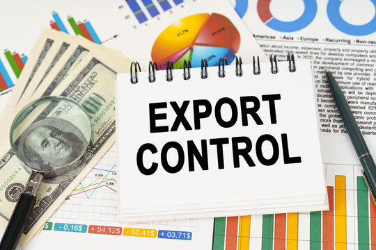 On the table are business charts, dollars and a notepad with the inscription - export control
