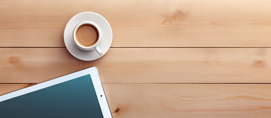 Aerial view of office desk with tablet phone coffee Empty space Copy space image Place for adding text or design