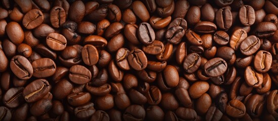 Obraz premium Close up background of roasted coffee beans Copy space image Place for adding text or design