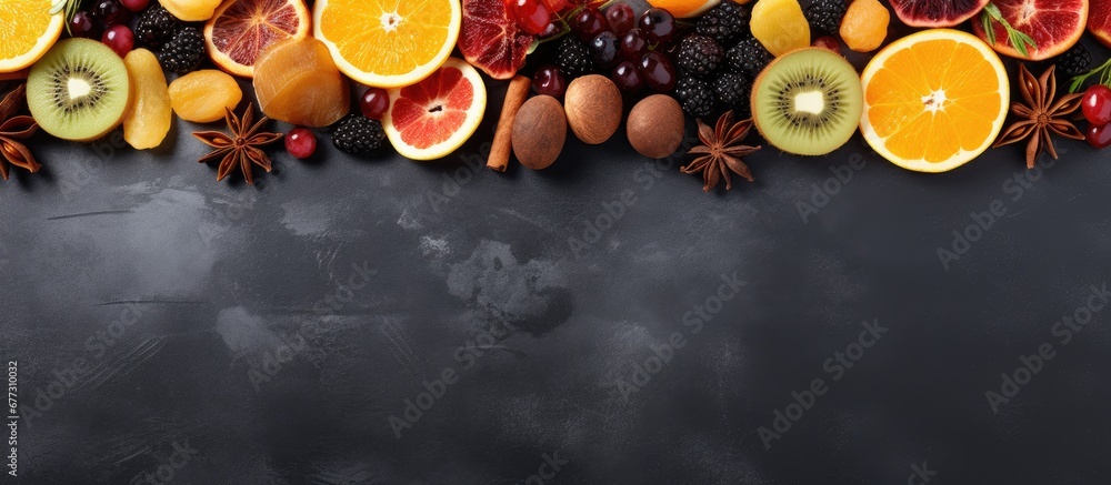Poster assorted dried fruits and berries on gray background copy space image place for adding text or desig