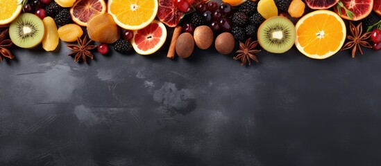 Obraz na płótnie Canvas Assorted dried fruits and berries on gray background Copy space image Place for adding text or design