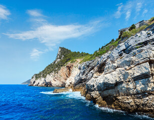 Fototapeta na wymiar Beautiful rocky sea coast view from sea (Portovenere, near Cinque Terre, Liguria, Italy)