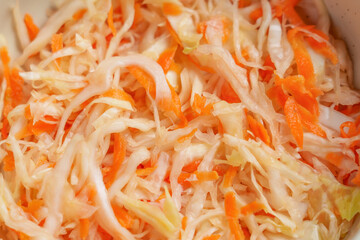 Fermented sauerkraut with chopped white cabbage and carrots