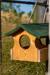 bird feeder. tree house for the birds, cheerful apartment, Close-up of a bird feeder on a tree 