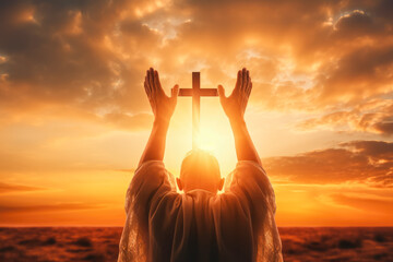 Christianity concept. Jesus Christ on the background of the sunset.