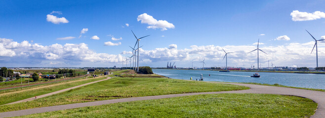 Panorama of the harbor of Rotterdam with wind turbines 